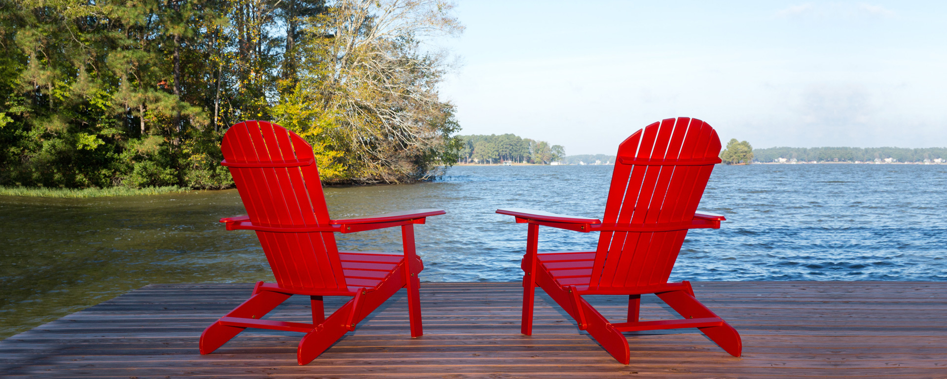 red chairs on dock at lake Gaston